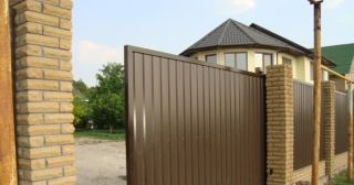 Купить откатные ворота из профнастила Саяногорск, цена от 1758 руб.